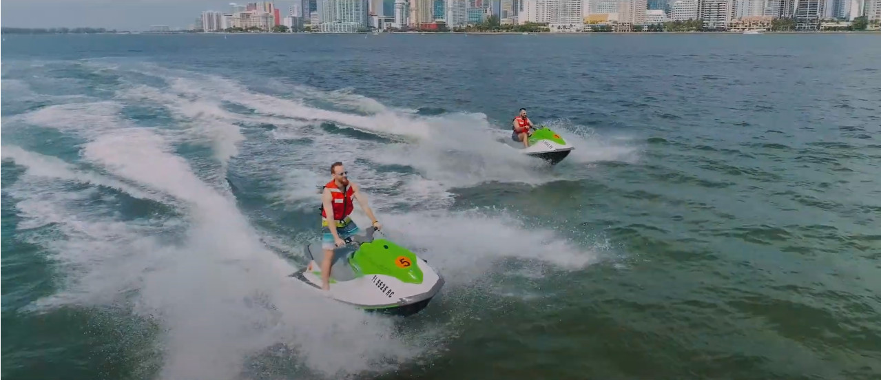 two men on jetski waverunners in miami